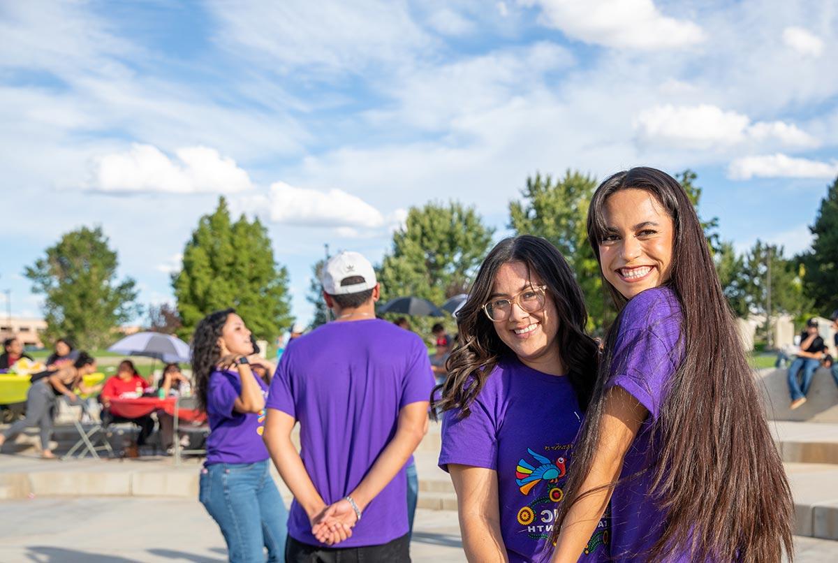 SJC Students at the fiesta at sunset smiling and dancing